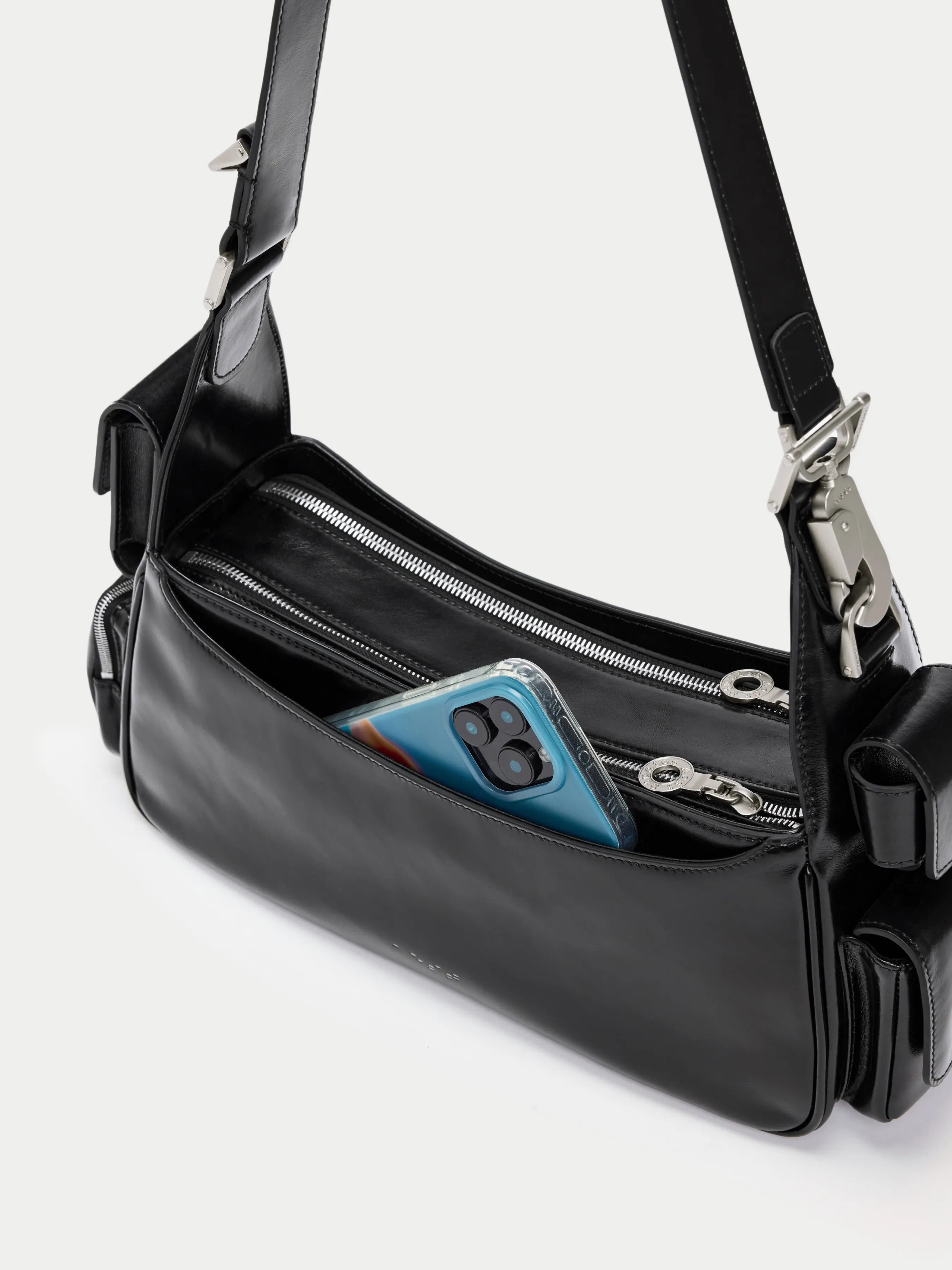 Capture Pocket Sling Bag