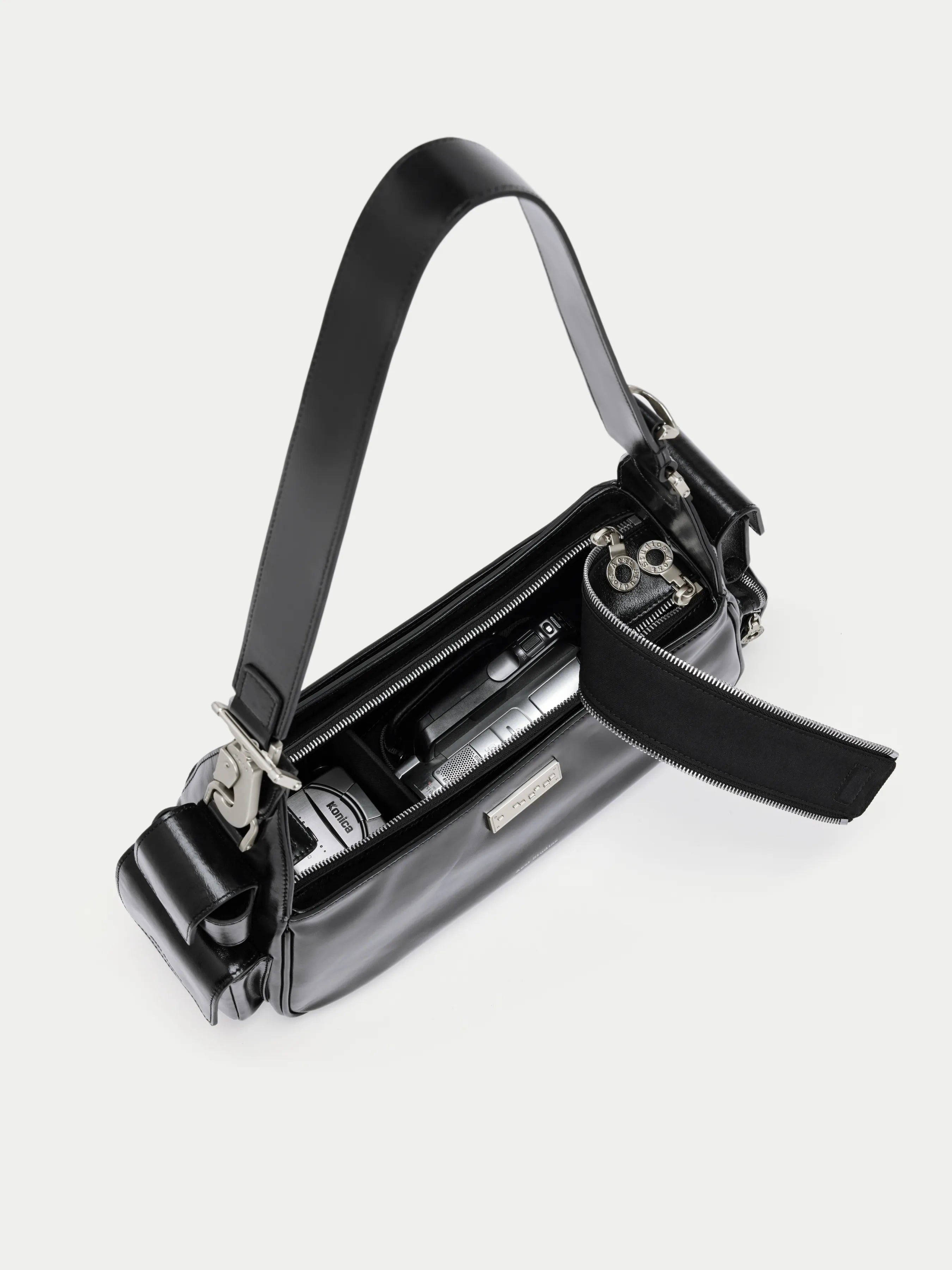 Capture Pocket Sling Bag